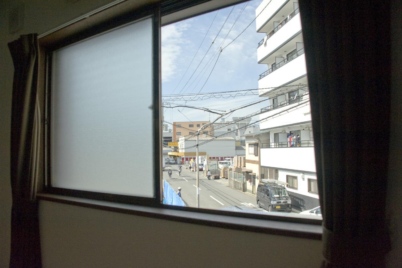 Umbrella House Hostel Osaka Bagian luar foto